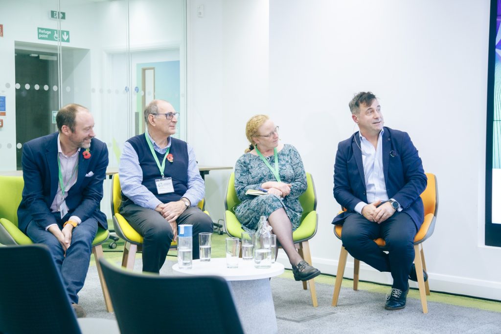 Members of the Aura CDT Conference 2022 panel discussion sat together including Will Apps of the Crown Estate, Peter Tavner of Durham University, Jane Cooper of Renewable UK and Juergen Maier of the Northern Powerhouse Partnership