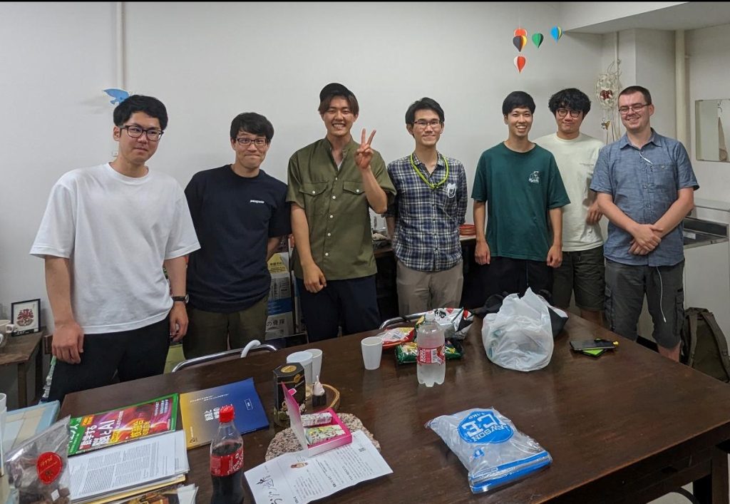 Ben Pickett with a group of postgraduate students in Japan