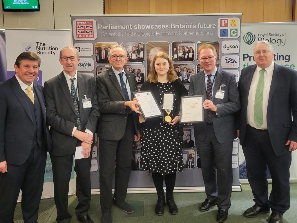 Anna Weatherburn receives her gold award at STEM for Britain